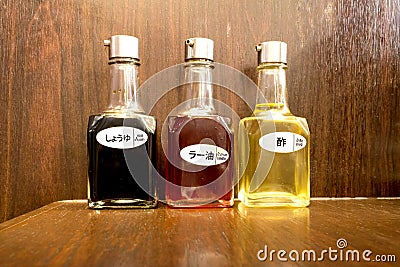 Three bottles of sesame oil and choyu sauce