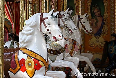 Three carousel horses