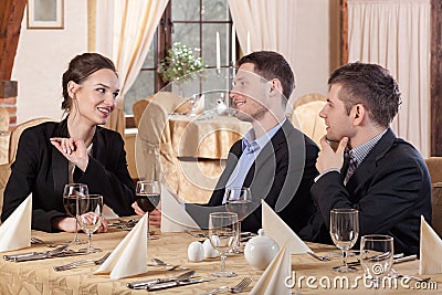 Three colleagues sitting in restaurant