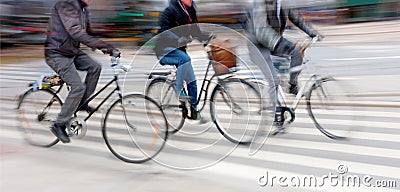 Three cyclists