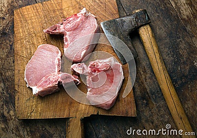 Three fresh raw pork chops