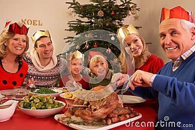 Three Generation Family Enjoying Christmas Meal