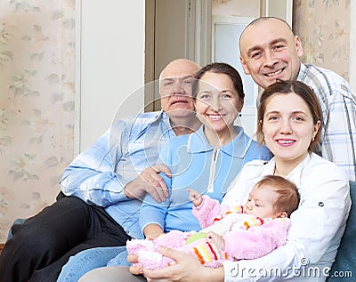 Three generations family with newborn baby