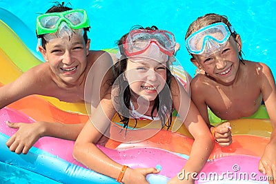 Three kids in the pool