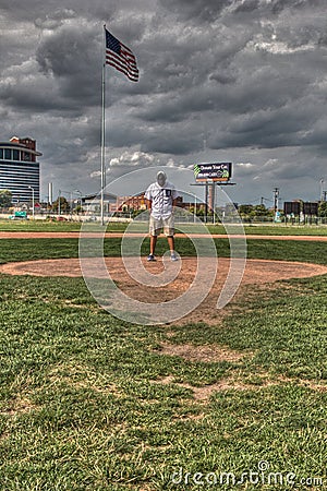 Tigers fan on the mound of the old Tiger Stadium