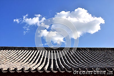 Tile and roof structure