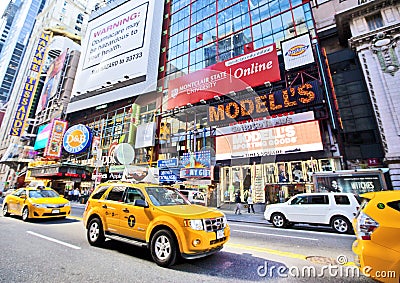 Time Square and taxis during the day