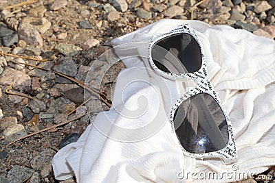 Time to take a vacation! White sunglasses are chic for summertime fashions!