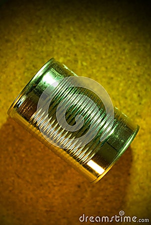 Tin can on a cork background