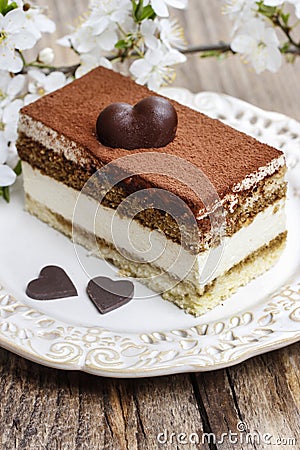 Tiramisu cake on white plate