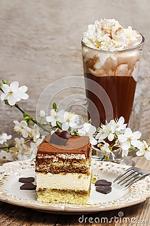 Tiramisu cake on white plate