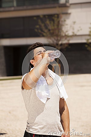 Tired athlete refreshing