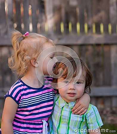 Toddler Girl Kissing Toddler Boy