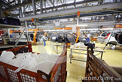 Car assembly, workers at Avtovaz factory