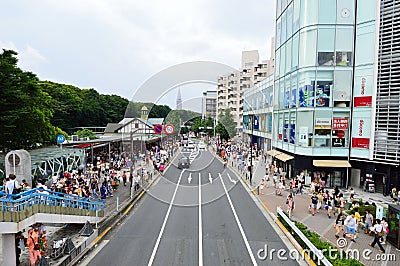 TOKYO - AUGUST 03: Shibuya in August 2013 - crowds of people crossing the center of Shibuya, the most important commercial center