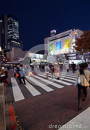 Tokyo, Japan - November 28, 2013: Pedestrians at the famed crossing of Shibuya