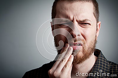 Toothache - man with teeth problems