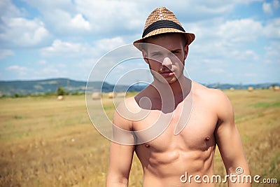 Topless man outdoor looks at you