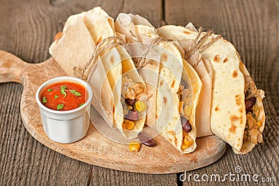 Tortillas with chicken, vegetables and cheese