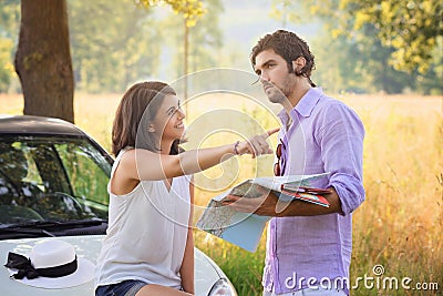 Tourist couple choosing the right direction