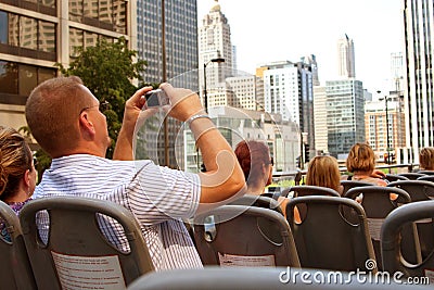 Tourist Takes Photos of Chicago Skyline From Bus
