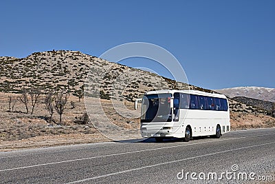 Tourist white Bus on Road