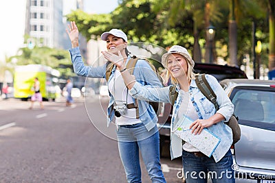 Tourists calling taxi