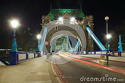 Tower Bridge entrance perspective at night, London