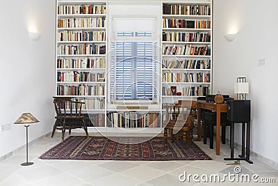 Town House With Books Arranged In Library