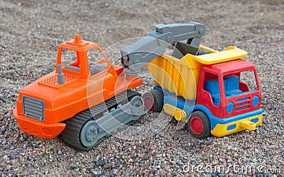 Toy dump truck and shovel