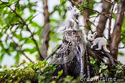 Toy kangaroo on stump