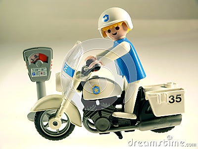 Toy policeman on bike