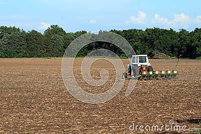 Tractor Planting The Field