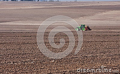 Tractor planting wheat