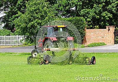 Tractor with trailer Mowing grass