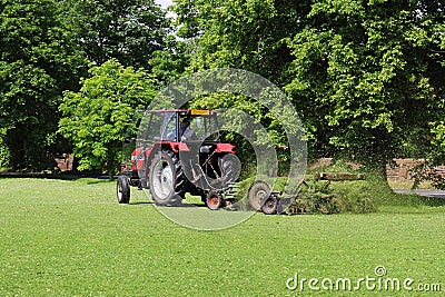 Tractor with trailer Mowing grass