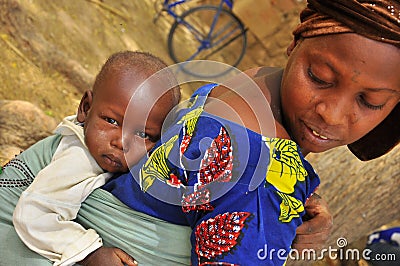 Traditional african women with baby on the back