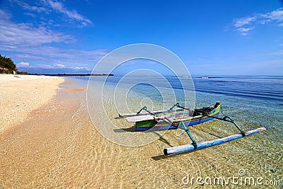 Traditional boat on tropical beach