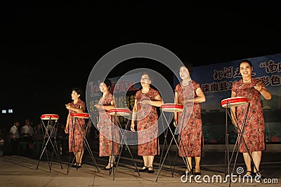 Traditional folk art form -- LeTing drums on a stage, north chin