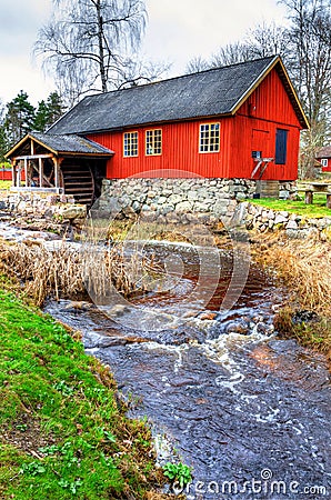 Traditional Swedish watermill with small river