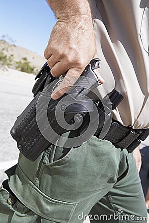 Traffic Cop Holding Gun