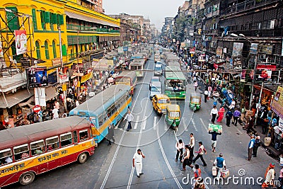 Traffic jam with hundreds of city taxi, buses and pedestrians