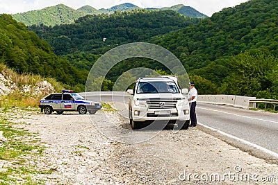Traffic police work on mountain road