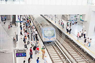 Train into the busy station, China