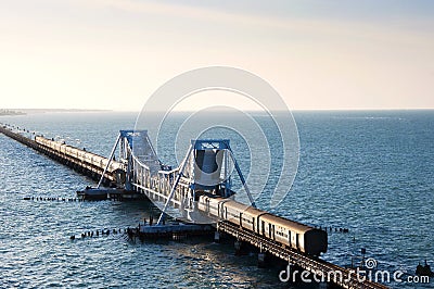 Train on a sea bridge in India