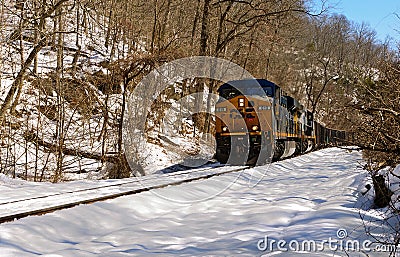 Train traveling on a snow-covered landscape