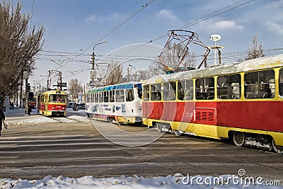 Trams run to meet each other. The city comes alive after an abnormal snowfall