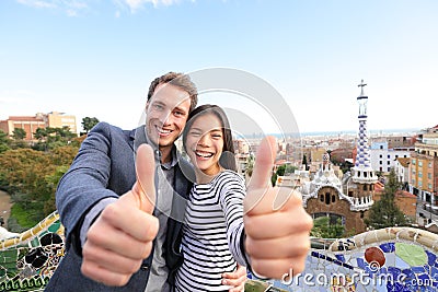 Travel couple happy in Park Guell, Barcelona