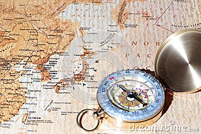 Travel destination Japan, ancient map with vintage compass