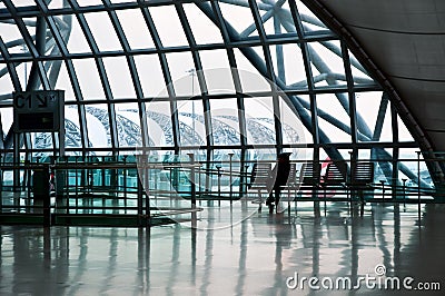 Traveler waiting in the airport hall